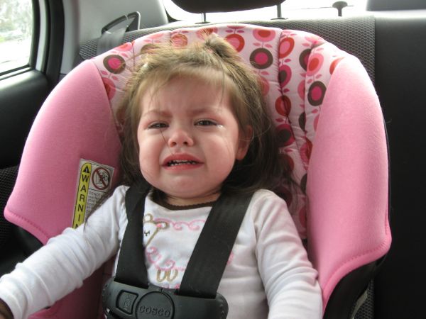 Little Audrey- not happy in the car!