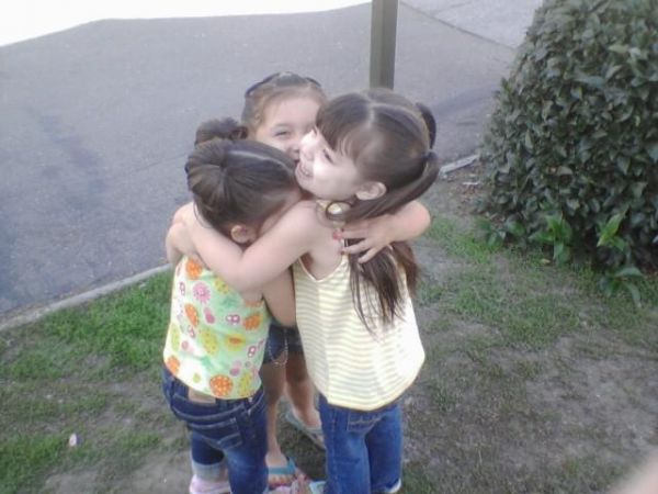Cousins hugging