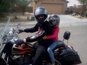 My middle daughter taking a ride with daddy!