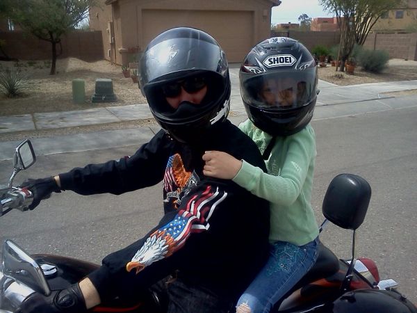 My oldest daughter taking a ride with daddy!