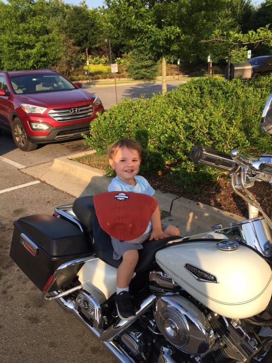Youngest Son William Checking out the Road King