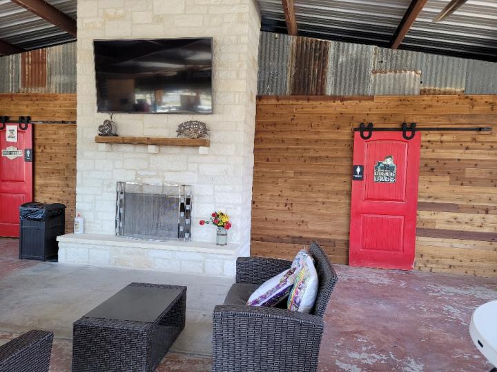 Fire place and big screen Tv in pavilion